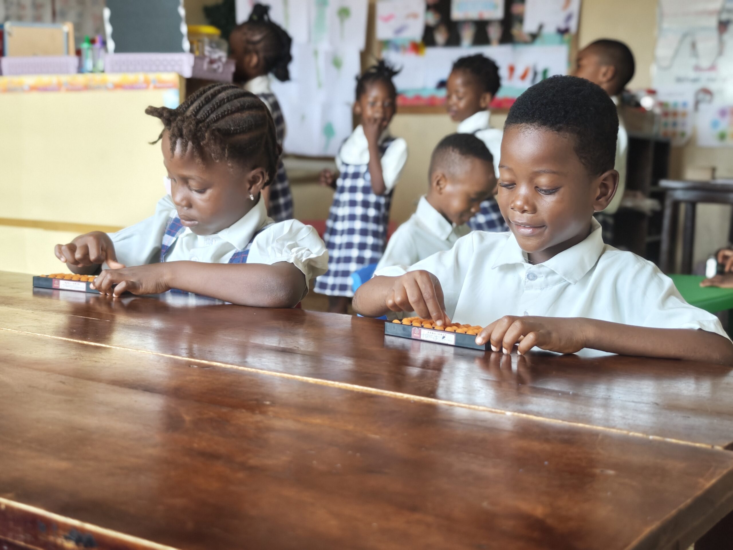 Ark of Hope young students using counting materials in class